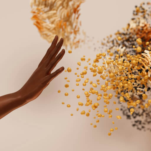 a hand throwing seeds